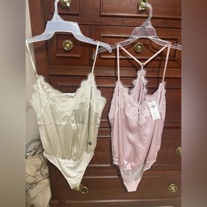 Two brand new Abercrombie and Fitch bodysuits